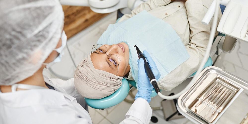 smiling-woman-dentists-chair_236854-37839.jpg