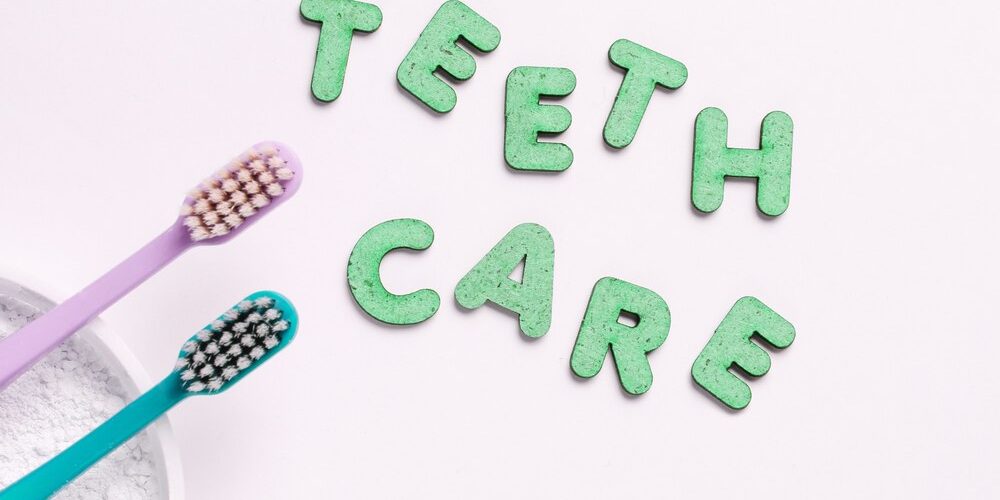 two-toothbrushes-tooth-powder-white-with-slogan-teeth-care_175682-14457 two-toothbrushes-tooth-powder-white-with-slogan-teeth-care_175682-14457.jpg